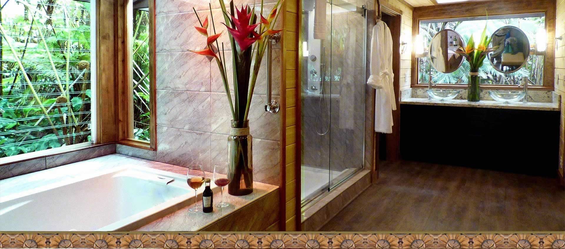 White Lotus Suite elegant master shower with stunning forest views.